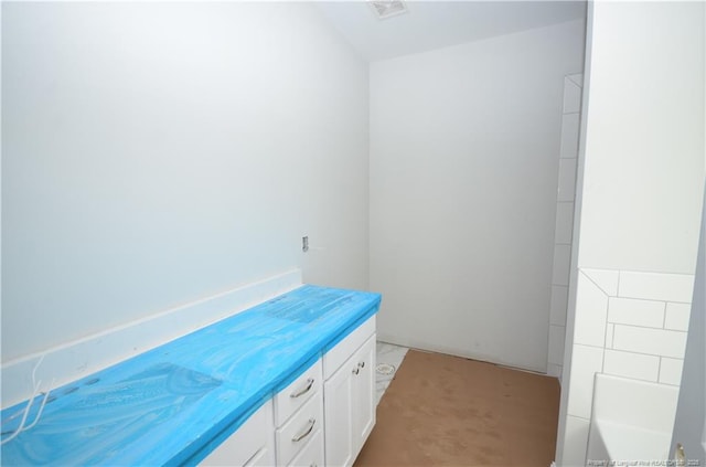 bathroom featuring a tub to relax in