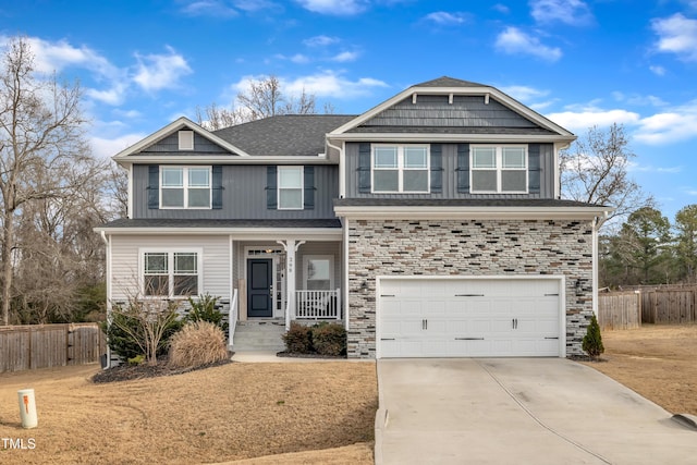 view of front of house with a garage and a front yard