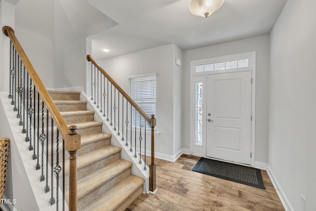 entrance foyer with light wood-type flooring