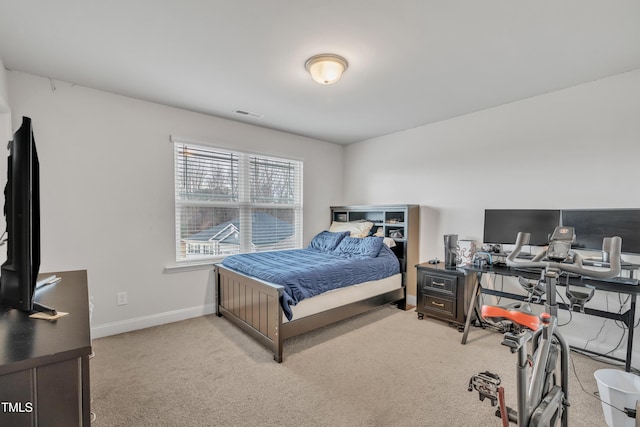 bedroom with light carpet