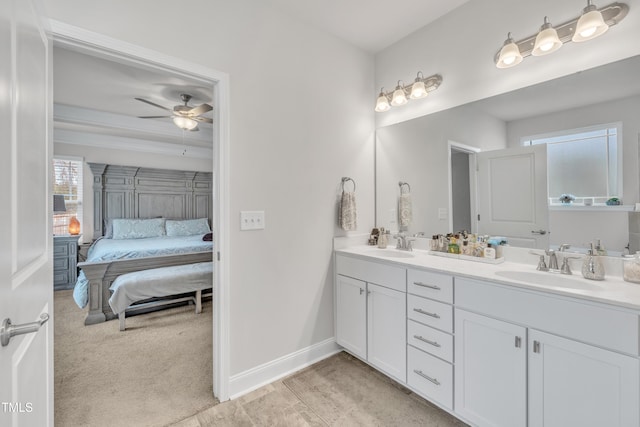 bathroom featuring vanity and ceiling fan