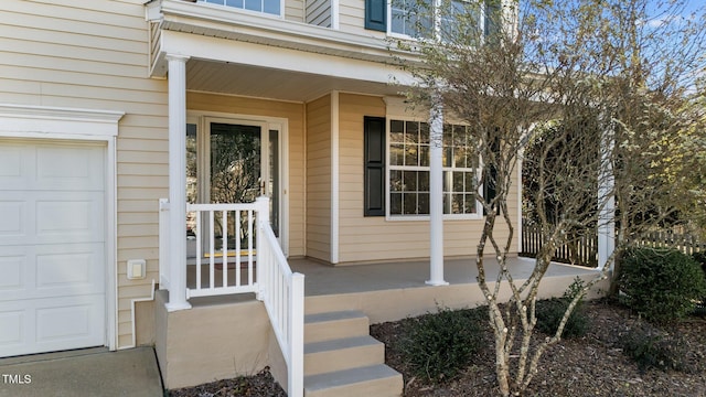 entrance to property featuring a porch