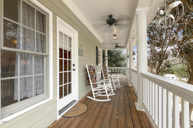 wooden deck with ceiling fan