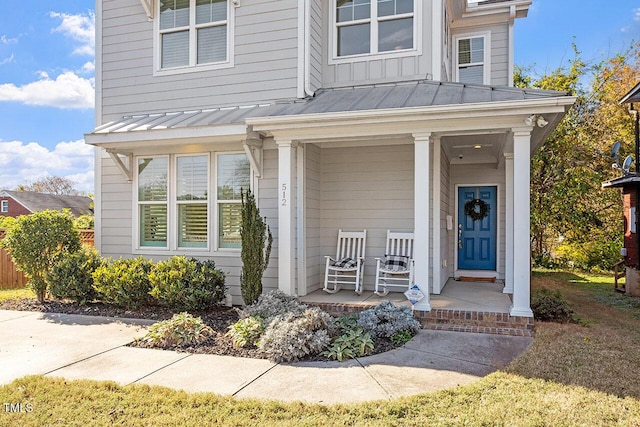 entrance to property with covered porch