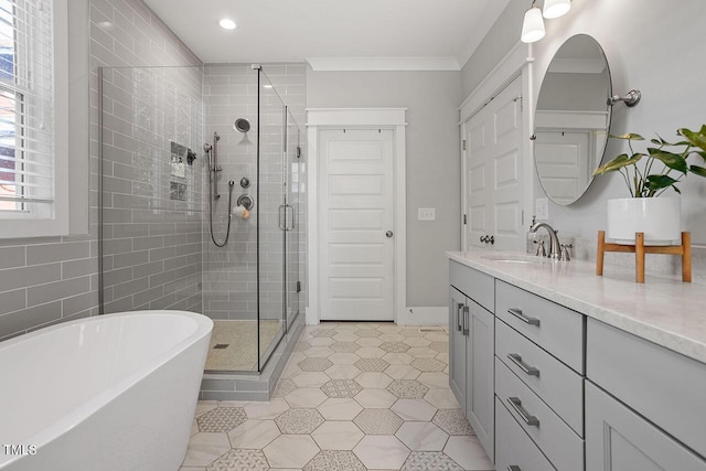 bathroom with independent shower and bath, crown molding, and vanity