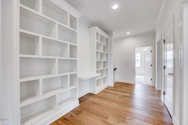 spacious closet featuring light hardwood / wood-style floors