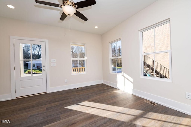 foyer featuring dark hardwood / wood-style floors and ceiling fan