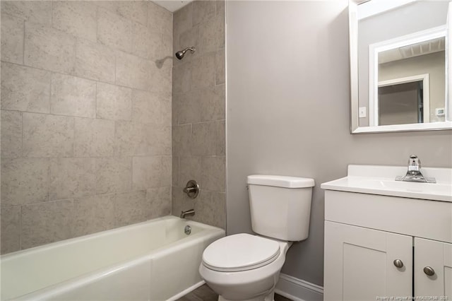 5193 Southport Dr, Fayetteville, NC 28311 - full bathroom with vanity, toilet, and tiled shower / bath