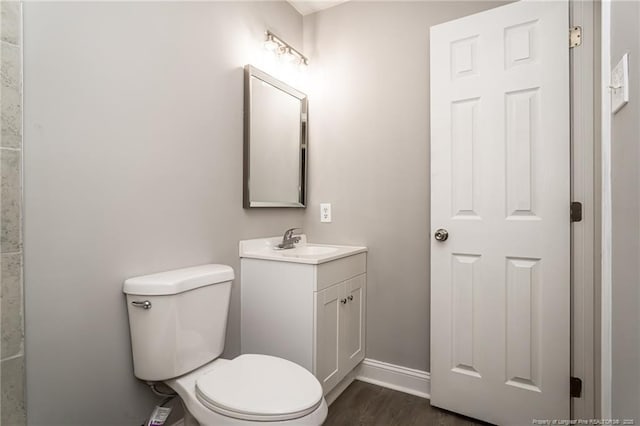 5193 Southport Dr, Fayetteville, NC 28311 - bathroom featuring wood-type flooring, vanity, and toilet