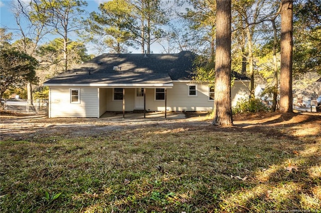 5193 Southport Dr, Fayetteville, NC 28311 - back of property featuring a yard and a patio