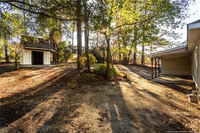 5193 Southport Dr, Fayetteville, NC 28311 - view of yard featuring a storage unit