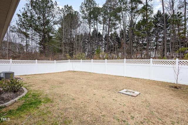 view of yard featuring central AC