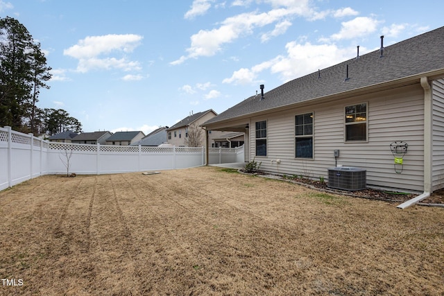 view of yard with central AC unit