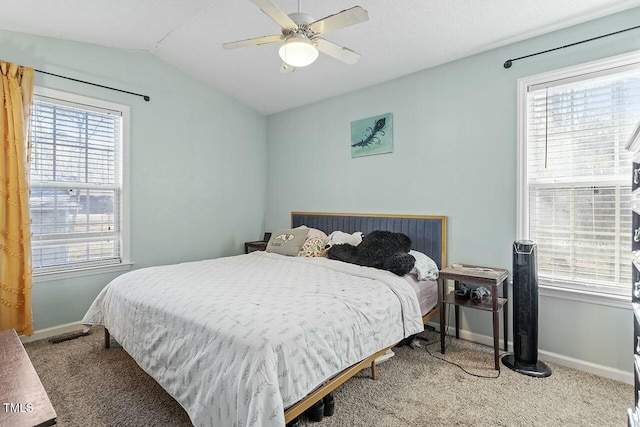 bedroom featuring ceiling fan, carpet, and vaulted ceiling