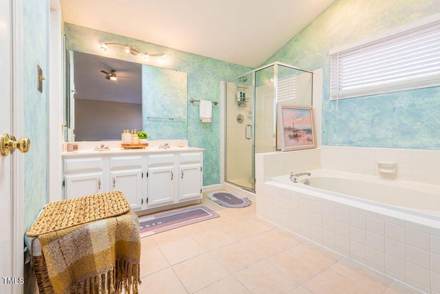 bathroom with tile patterned floors, vanity, plus walk in shower, and lofted ceiling