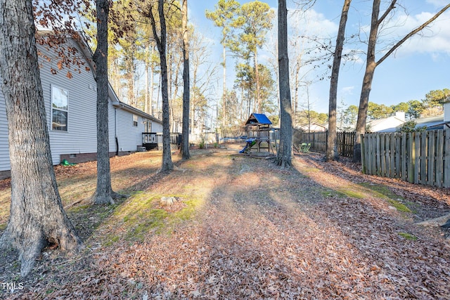 view of yard featuring a playground