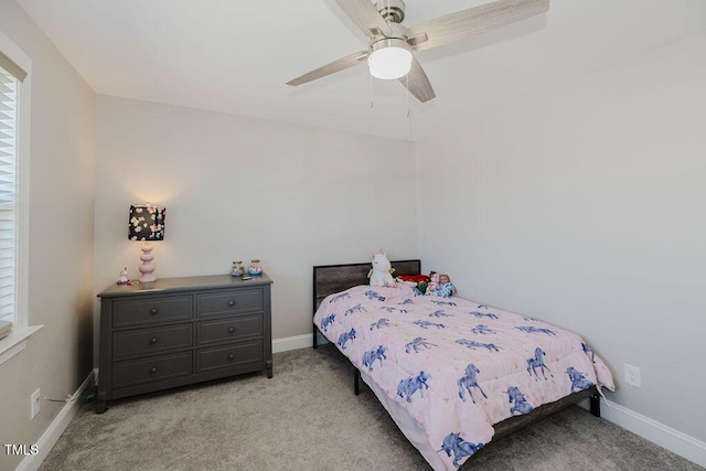 bedroom with light carpet and ceiling fan