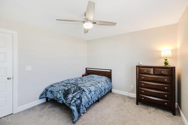 bedroom with light colored carpet and ceiling fan