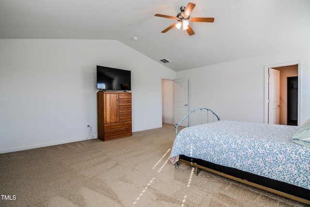 carpeted bedroom featuring vaulted ceiling and ceiling fan