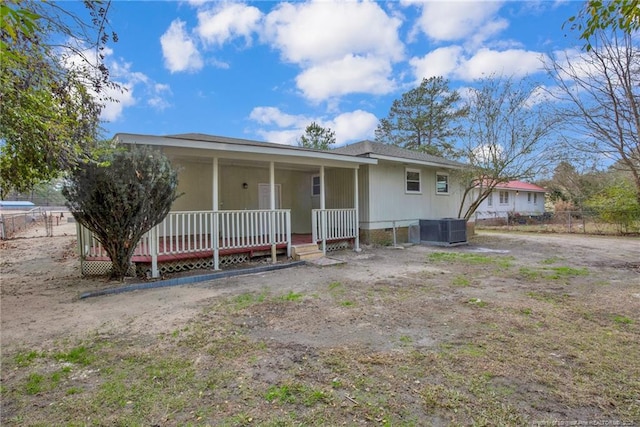 view of front of house featuring central AC and a porch