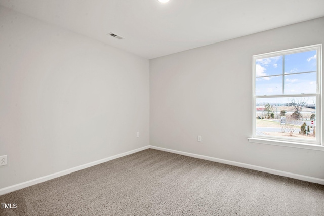 view of carpeted spare room