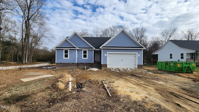 view of front of home with a garage