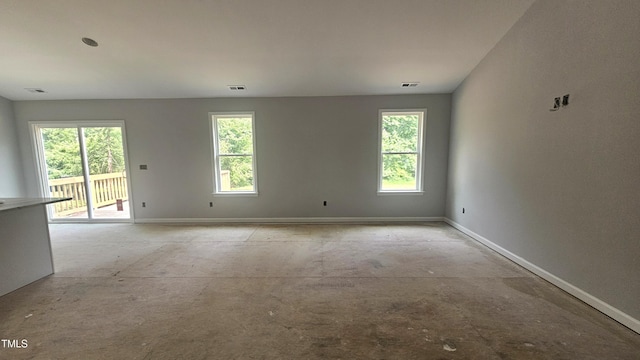 121 Tanglewood Dr Unit 8-J, Louisburg, NC 27549 - empty room featuring healthy amount of natural light and baseboards