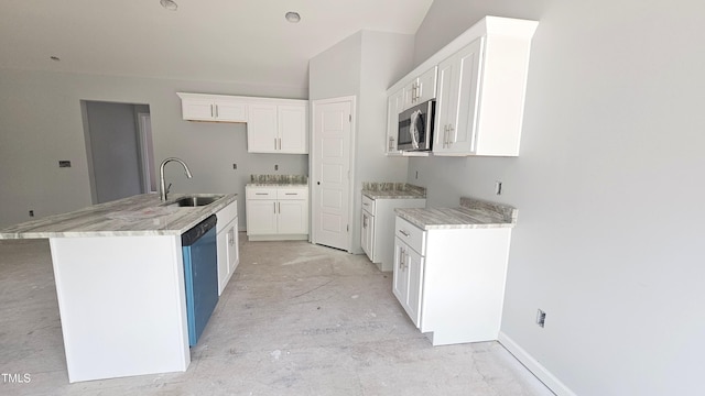 121 Tanglewood Dr Unit 8-J, Louisburg, NC 27549 - kitchen featuring a sink, stainless steel microwave, dishwasher, white cabinetry, and a center island with sink