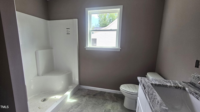 121 Tanglewood Dr Unit 8-J, Louisburg, NC 27549 - full bath with toilet, baseboards, a shower, and vanity