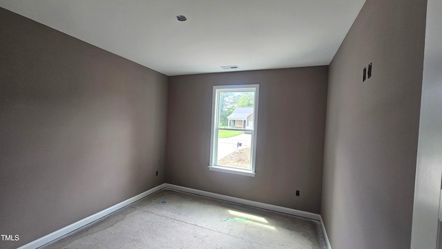 121 Tanglewood Dr Unit 8-J, Louisburg, NC 27549 - spare room featuring baseboards