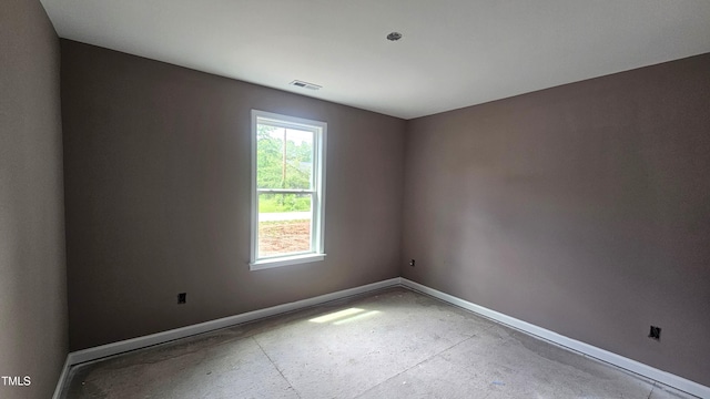121 Tanglewood Dr Unit 8-J, Louisburg, NC 27549 - spare room featuring baseboards