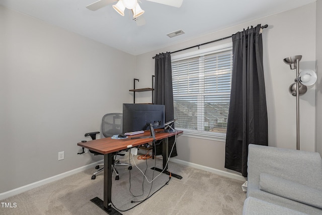 office area with light colored carpet and ceiling fan