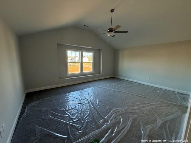 bonus room featuring vaulted ceiling, baseboards, and ceiling fan