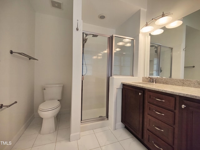 bathroom featuring visible vents, toilet, a stall shower, vanity, and baseboards