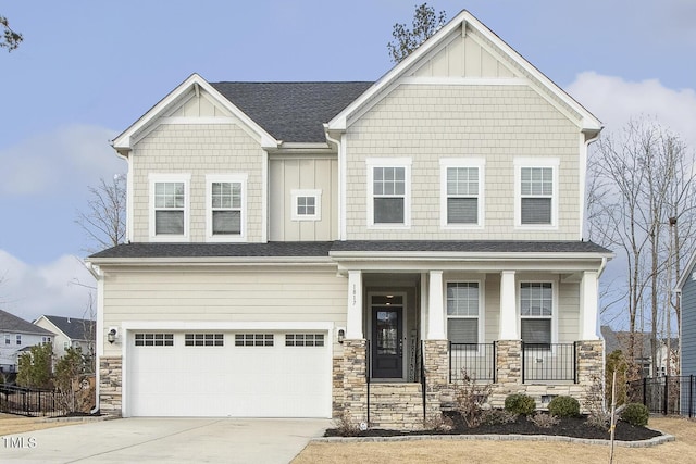 craftsman house featuring a garage and a porch