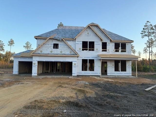 property in mid-construction featuring an attached garage