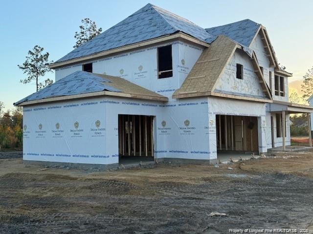 property under construction with a garage