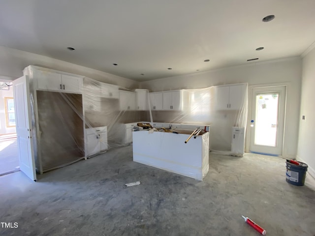 kitchen featuring white cabinets