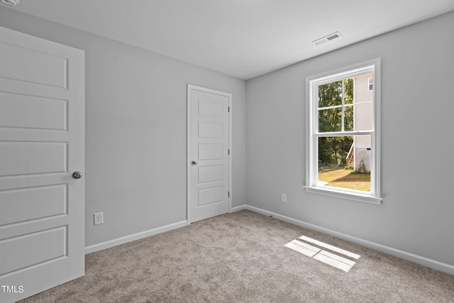 view of carpeted spare room