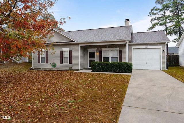 ranch-style home featuring a garage