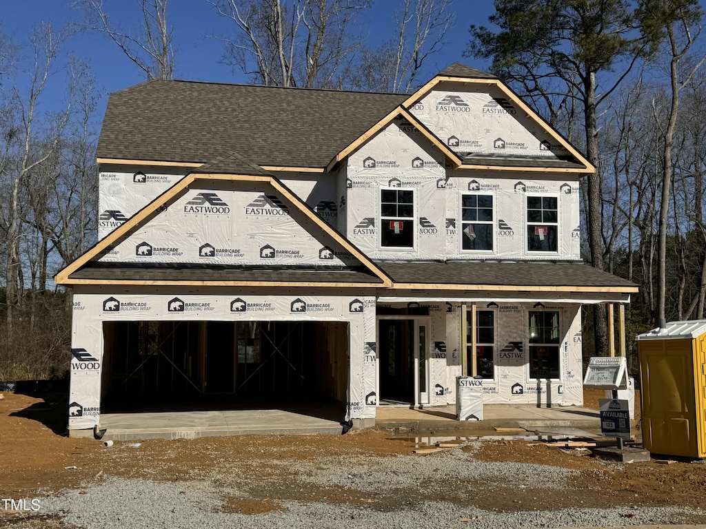 property under construction with covered porch