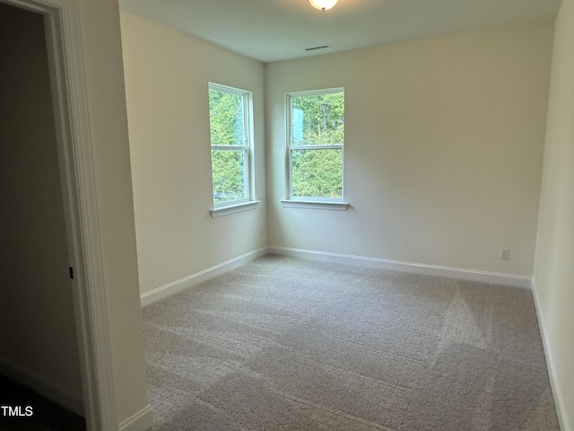 129 Stallion Way, Benson, NC 27504 - spare room with carpet flooring and baseboards