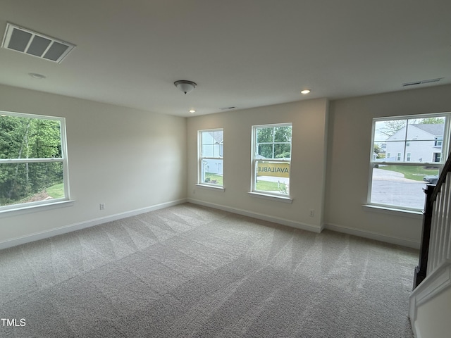 129 Stallion Way, Benson, NC 27504 - carpeted empty room with plenty of natural light, baseboards, and recessed lighting