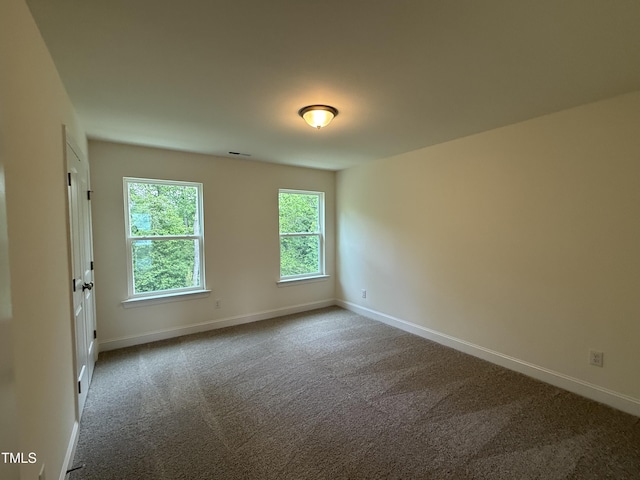 129 Stallion Way, Benson, NC 27504 - carpeted spare room with baseboards