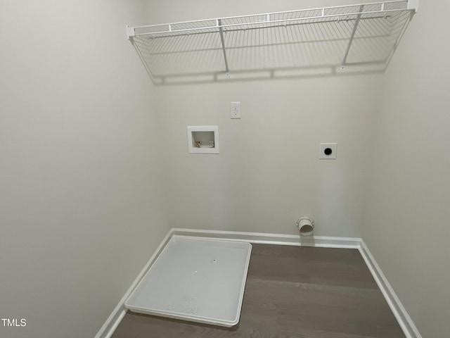 washroom with hardwood / wood-style floors, washer hookup, and hookup for an electric dryer