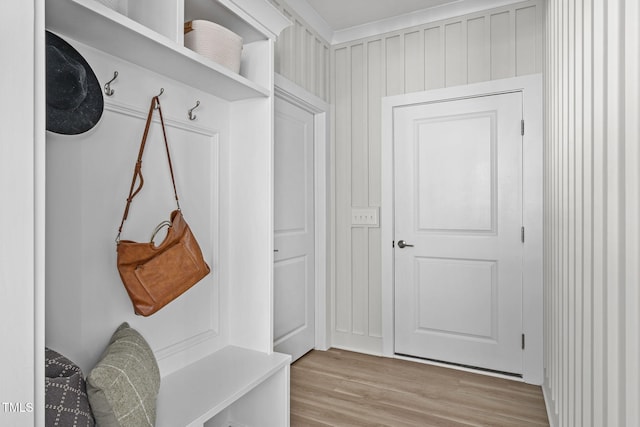 mudroom with light wood finished floors