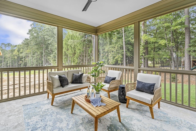 sunroom / solarium with ceiling fan