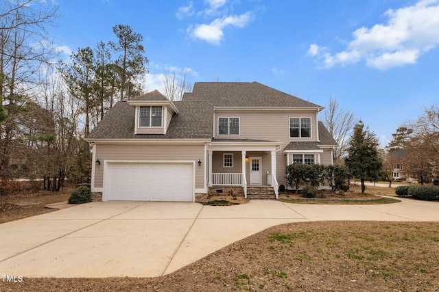 front of property with a garage and a porch