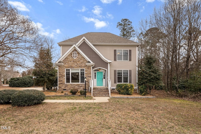 view of front of home with a front lawn