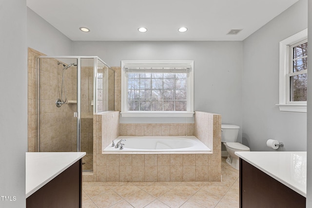 full bathroom with tile patterned floors, toilet, vanity, and separate shower and tub